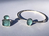 Silver wire bracelet with turquoise glass attachment; matching ring