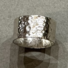 Wide ring of beaten silver